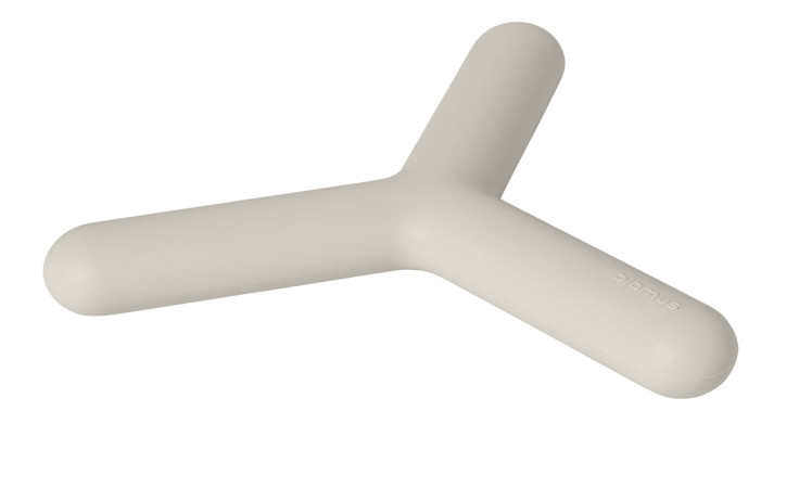 Untersetzer Flip 15 cm aus Silikon und Kunststoff in beige / weiß.