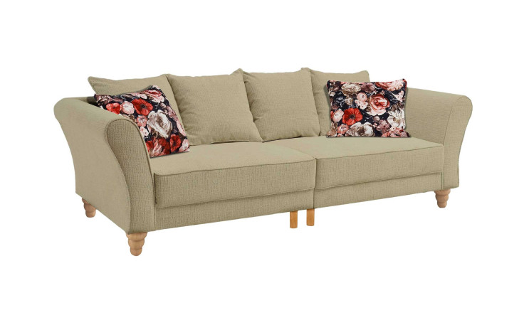 Big Sofa Sand, Füße Eiche Natur, Rückenkissen in Bezugsfarbe sowie zwei Kissen mit floralem Muster