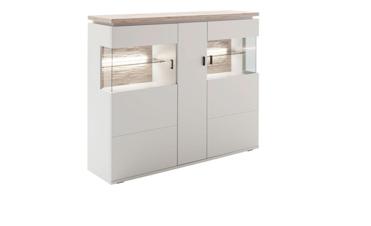 Komfort-Highboard Amant aus Holzwerkstoff in Modern White und einer Absetzung in Viking Oak. Schräge Seitenansicht.