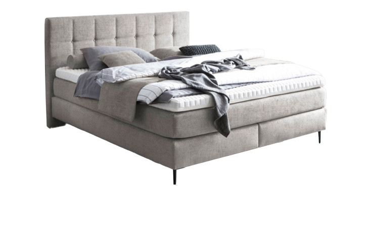 Basis-Boxspringbett MONDO Barell-Almeria in einem beigen Bezugsstoff.