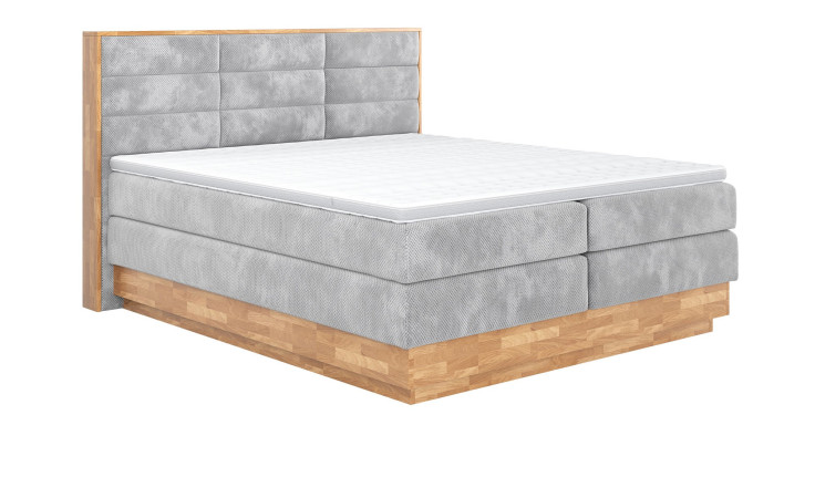 Boxspringbett VALMONDO Incana in einem Stoffbezug in Stone und einem Sichtholzrahmen in Eiche