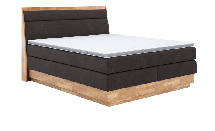 Boxspringbett VALMONDO Incana in einem Stoffbezug in Charcoal und einem Sichtholzrahmen in Eiche