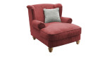 Loveseat-Sessel Bordeaux in der Farbe korallerot mit einem silberfarbigem Kissen