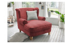 Loveseat-Sessel Bordeaux in der Farbe korallerot mit einem silberfarbigem Kissen, in einem Raum stehend
