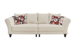 Big Sofa Pearl, Füße Schwarz, Rückenkissen in Bezugsfarbe sowie zwei Kissen mit floralem Muster