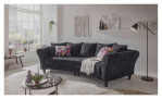 Milieubild Big Sofa in Anthrazit mit Kissen in Bezugsfarbe sowie floralem Muster