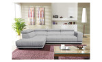 Komfort-Ecksofa VIA ARTEON in der Farbe grau, Frontansicht in einem Raum mit Deko