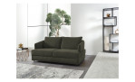 Schlafsofa Edina, in der Farbausführung grün, in einem Raum stehend, Schrägansicht