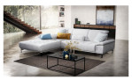 Komfort- Ecksofa Florenz Comfort, in der Farbausführung Silber, in einem Raum stehend