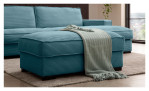 Hocker Holly in einem Türkisblauen Cordstoff bezoegn. Auf einem dekorierten hintergrund