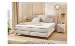 Boxspringbett KaprunMax in einem Chenillestoff in der Farbe beige, in einem Raum stehend