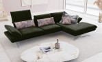 Koinor Komfort-Ecksofa Elements in dunkelgrün im Wohnzimmer