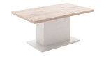 Couchtisch Amant aus Holzwerkstoff mit einem Gestell in Modern White und einer Tischplatte in Viking Oak. Schräge Seitenansicht.