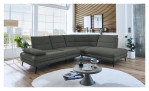 Basis-Ecksofa plano|FORM Bonn in einem Bezugsstoff in Leaf mit schwarzen Metallfüßen. Auf einem dekorierten Hintergrund.