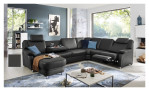 Wohnlandschaft plano|FORM Tyler in einem Echtlederbezug in Anthrazit. Mit gezeigter Wall-Away-Funktion