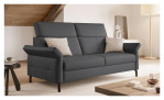 Basis-Sofa Salome in einem Bezugsstoff in Graphite. Auf einem dekorierten Hintergrund