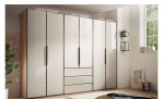 Basis-Drehtürenschrank Phönix mit Sandglas-Front und drei Schubladen im Mittelelement im Schlafzimmer