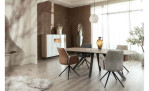 Highboard Lindfield mit Korpus, Fach und Schublade in der Farbe Eiche und weißer Front, darauf steht ein Zeitungsständer, in einem Speisezimmer 