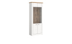 Vitrine Manhattan in weiß mit einer sichtbaren Rückwand und einer Abdeckplatte in Nox Oak. Schräge Seitenansicht.