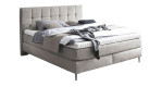 Komfort-Boxspringbett MONDO Barell-Almeria in einem Beigen Stoffbezug.