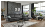 Komfort-Ecksofa MONDO Mirium in einerm Echtlederbezug in Anthrazit. Auf einem dekorierten Hintergrund