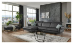 Komfort-Ecksofa MONDO Mirium in einerm Echtlederbezug in Anthrazit. Auf einem dekorierten Hintergrund