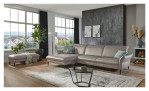Komfort-Ecksofa MONDO Mirium in einerm Echtlederbezug in Granit. Auf einem dekorierten Hintergrund
