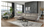 Basis-Ecksofa MONDO Mirium in einerm Echtlederbezug in Granit. Auf einem dekorierten Hintergrund