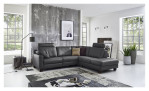 Basis-Ecksofa MONDO Maestra in einem Echtlederbezug in der Farbe Anthrazit. Auf einem dekorierten Hintergrund