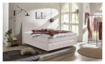 Boxspringbett vito Assetto in der Farbe Almond Milk im Schlafzimmer