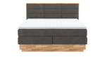 Boxspringbett VALMONDO Incana in einem Stoffbezug in Dark Grey und einem Sichtholzrahmen in Eiche