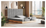 Boxspringbett VALMONDO Incana in einem Stoffbezug in Steel und einem Sichtholzrahmen in Eiche. Mit gezeigter motorischer Funktion