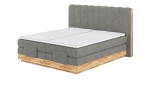 Boxspringbett VALMONDO Incana in einem Stoffbezug in Sand und einem Sichtholzrahmen in Eiche. 