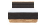 Boxspringbett VALMONDO Incana in einem Stoffbezug in Charcoal und einem Sichtholzrahmen in Eiche