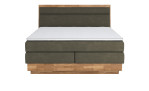 Boxspringbett VALMONDO Incana in einem Stoffbezug in Hunter und einem Sichtholzrahmen in Eiche