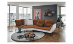 Komfort-Ecksofa vito Ticona, in der Farbausführung Kupfer / Silver, in einem Raum stehend mit der Rückenfunktion