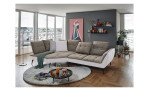 Komfort-Ecksofa vito Ticona, in der Farbausführung Taupe / Silver, in einem Raum stehend mit der Rückenneigung