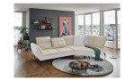 Komfort-Ecksofa vito Ticona, in der Farbausführung Creme / Silver, in einem Raum stehend mit der Rückenneigung