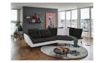 Komfort-Ecksofa vito Ticona, in der Farbausführung Schwarz / Silver, in einem Raum stehend mit der Rückenneigung