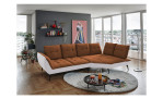 Komfort-Ecksofa vito Ticona, in der Farbausführung Kupfer / Silver, in einem Raum stehend ohne Kissen