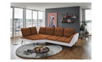 Komfort-Ecksofa vito Ticona, in der Farbausführung Kupfer / Silver, in einem Raum stehend ohne Kissen