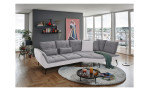 Komfort-Ecksofa vito Ticona, in der Farbausführung Silver in einem Raum stehend