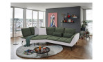 Komfort-Ecksofa vito Ticona, in der Farbausführung Olive / Silver in einem Raum stehend