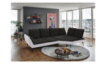 Basis-Ecksofa vito Ticona, in der Farbausführung Schwarz / Silber, in einem Raum stehend