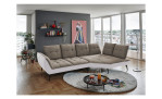 Basis-Ecksofa vito Ticona, in der Farbausführung Taupe / Silber, in einem Raum stehend