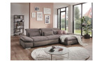 Komfort - Ecksofa vito Fulla, in der Farbausführung Taupe mit Kissen, in einem Raum stehend