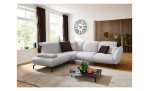 Komfort-Ecksofa vito Bevy, in der Farbausführung Silver, in einem Raum stehend