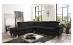Komfort-Ecksofa vito Tonga, in der Farbausführung Schwarz, in einem Raum stehend