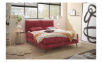 Boxspringbett set one Baldwin in der Farbe rot, in einem Raum stehend