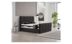 Bett Lavello, in der Farbausführung Anthrazit in einem Raum stehend mit Kissen und einer Tagesdecke
